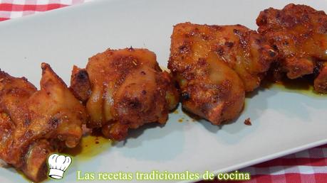 Manitas de cerdo adobadas al horno