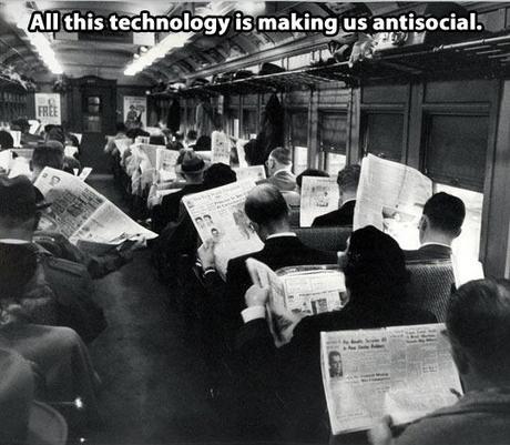 back-in-times-people-reading-newspapers-in-train
