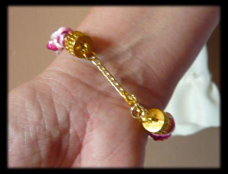 Pulsera espiral con disco Kumihimo