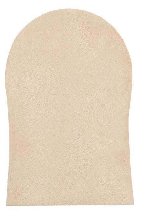 Cómo aplicar (bien) el autobronceador Manopla de St. Tropez.