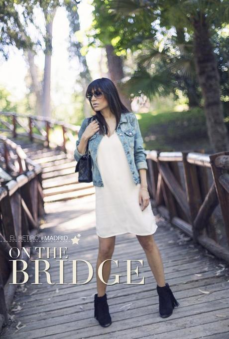 street style barbara crespo on the bridge el retiro madrid white studded dress zara chanel denim jacket fashion blogger outfit blog de moda