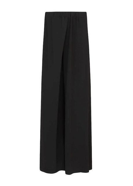 Pantalones palazzo Con efecto de frontal cruzado, de Mango.