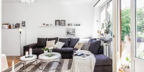 El encanto nórdico de un piso neutro en blanco y gris