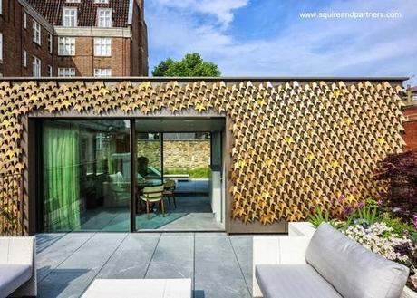 Último nivel de una residencia en Mayfair, Londres, entre medianeras vecina a casas antiguas Casa contemporánea con fachadas originales en Mayfair - Londres