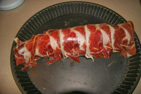 SOLOMILLO IBERICO DE CERDO ENVUELTO EN JAMÓN, RELLENO DE CHORIZO Y PATATAS A LO 