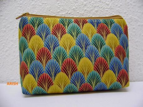 DE  HOJITAS COLOR NARANJA Y EN AZUL Y ORO