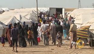 Miles de personas huyen de la violencia en Irak