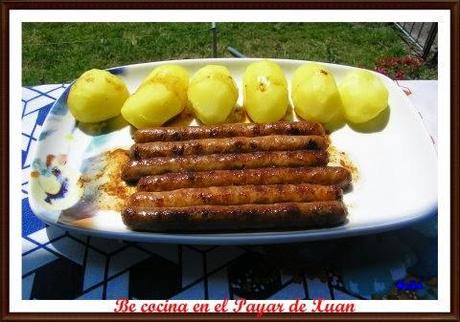 Salchichas al vino blanco