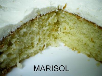 Bizcocho de coco con cubierta de queso  al toque de naranja