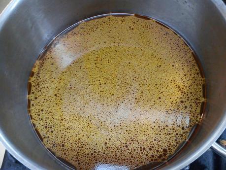 Arroz negro en paella (traditional black rice paella,  mediterranean style)