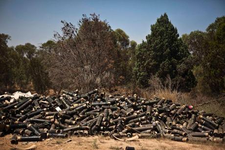 Mortar cases are piled at a staging area near the border with the Gaza Strip