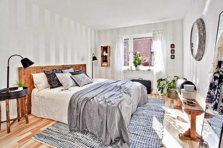 UN CÁLIDO APARTAMENTO EN GRIS Y MADERA