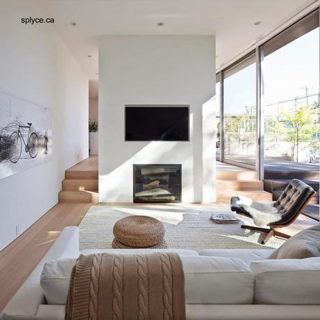 Sala de estar con chimenea en open plan