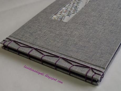 Encuadernación con ventana y cosido japonés.