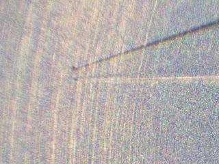 Fotografía de una partícula en el interior de uno de los contenedores de Hayabusa