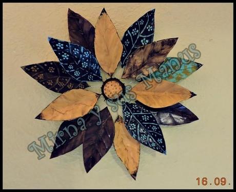 Flor reciclando Latas de Aluminio