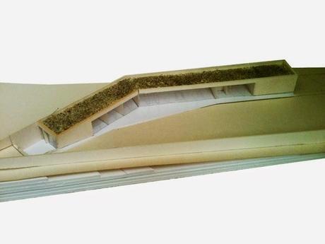 Esta otra representación evidencia la integración acentuada por el techo ecológico Maqueta de la casa vista a vuelo de pájaro