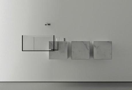 Diseño minimalista en lavabo de mármol y cristal