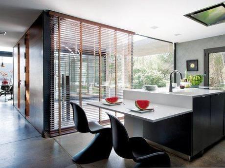 sillas tulip de knoll sillas panton vitra muebles de diseño mecedora balancín eames vitra estilo industrial casas prefabricadas casas de revista Casa prefabricada de hormigón blog decoracion interiores arquitectura minimalista hormigón 