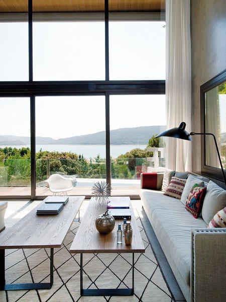 sillas tulip de knoll sillas panton vitra muebles de diseño mecedora balancín eames vitra estilo industrial casas prefabricadas casas de revista Casa prefabricada de hormigón blog decoracion interiores arquitectura minimalista hormigón 