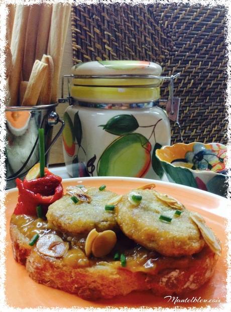 Tosta de medallones de manitas con piquillo y almendras 8