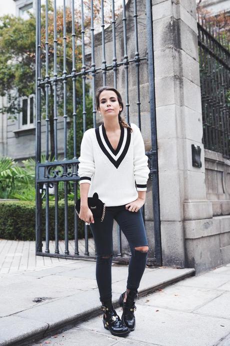 Varsity_Jersey-Black_Jeans-Balenciaga_Cut_Out_Boots-Black_Jeans-Cat_Bag-Outfit-Street_Style-34