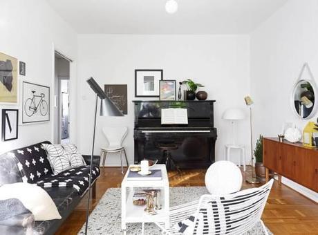 Diseños de los 60 en un piso muy actual sillas serie 7 lampara flower pot lampara aj estilo nórdico escandinavo mitad de siglo estilo moderno contemporáneo estilo mid century modern estantería string diseños de los 60 decoración decoración de salones decoración de interiores blog