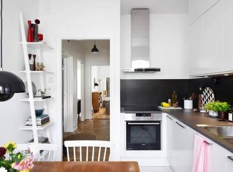 Diseños de los 60 en un piso muy actual sillas serie 7 lampara flower pot lampara aj estilo nórdico escandinavo mitad de siglo estilo moderno contemporáneo estilo mid century modern estantería string diseños de los 60 decoración decoración de salones decoración de interiores blog