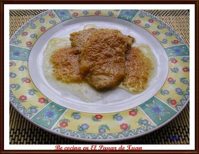 Lomo asado en salsa de cebollas