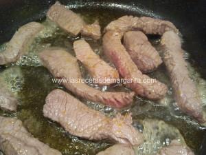 Ternera salteada con naranja y setas