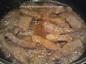 Ternera salteada con naranja y setas