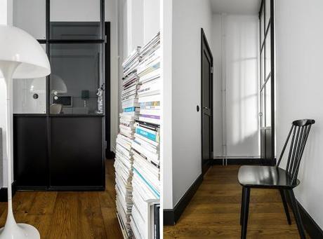 Cocina de forma rectangular sillas Serie 7 de Fritz Hansen sillas Eames DAX de Vitra muebles de diseño estilo nórdico decoración de salones decoración de comedores cocinas nórdicas negro y blanco cocinas modernas negras cocinas alargadas rectangulares