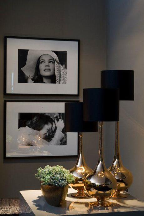 Love the gold finish table lamps with the jet black shades.....makes the space!