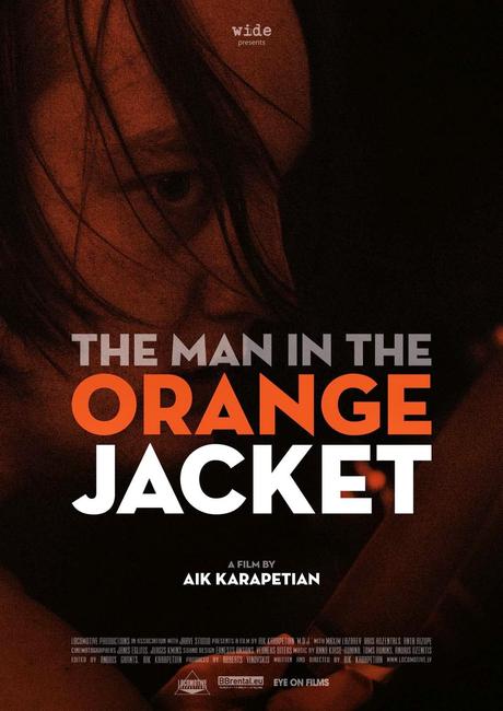 The Man in the Orange Jacket