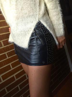 Sweater and leather skirt