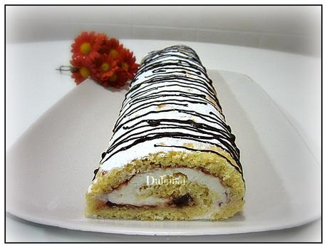 BRAZO DE GITANO RELLENO DE NATA Y MERMELADA BRAZO DE GITANO RELLENO DE NATA Y MERMELADA