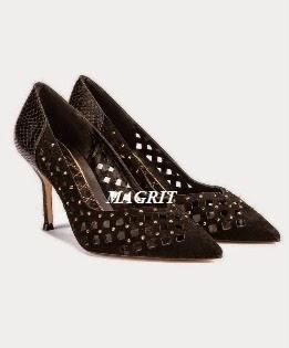 Dña. Letizia, llamativo rojo y elegante blanco y negro, en Italia