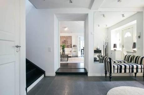 Vivir en una villa en el centro de una capital a lo grande decoración salones y comedores decoración nórdica escandinava decoración lujosa decoración americana cocinas nórdicas con isla cocinas blancas modernas casas grandes nórdicas blog decoración nórdica 