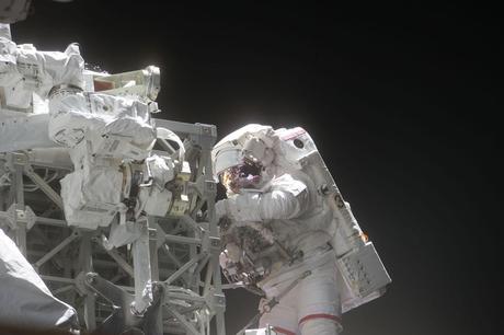 With his Extravehicular Mobility Unit spacesuit backdropped against the blackness of space, NASA astronaut Andrew Feustel is pictured during the STS-134 mission's third spacewalk