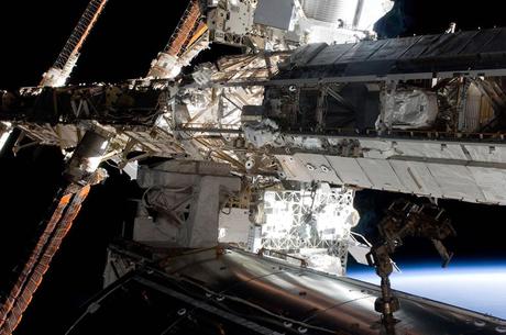 May 20 astronauts Andrew Feustel and Greg Chamitoff work on ISS