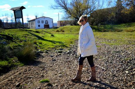 White parka and ethnic socks.