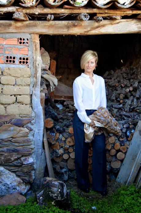 Palazzo pants and faux fur coat.