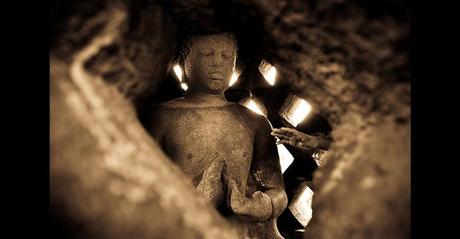 Hope at Borobudur temple, Java, Indonesia. Touching of Buddha gives people a hope to make their dreams real