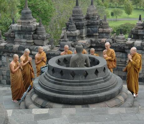 Buddhist monks praying at borobudur