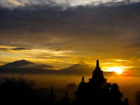 sunrise was taken at the Borobudur Temple, Magelang, Central Java, Indonesia. The two mountains in the background are Mount Merbabu and Mount Merapi