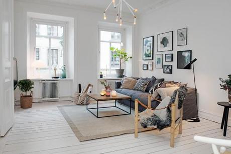 suelo de madera blanca puro nórdico en blanco gris y negro piso pequeño estilo nórdico muebles de diseño lámina poster new york manhattan estilo nórdico estanterías string diseño sueco diseño nórdico cocinas blancas pequeñas nórdicas blog decoración nórdica 