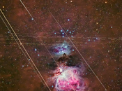 Astronomía: Gemínidas satélites geoestacionarios sobre nebulosa Orión.