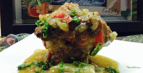 Paletilla de cordero en salsa con chalotas confitadas