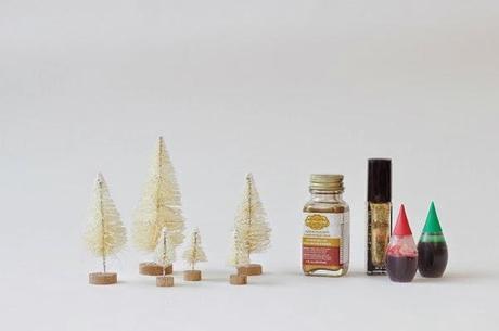 4 ideas DIY de Navidad para hacer con nuestros hijos Árboles con reflejos dorados