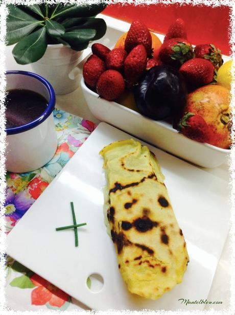 Tortita de maiz con morcilla y fundido de queso Tortita de maiz con morcilla y fundido de queso